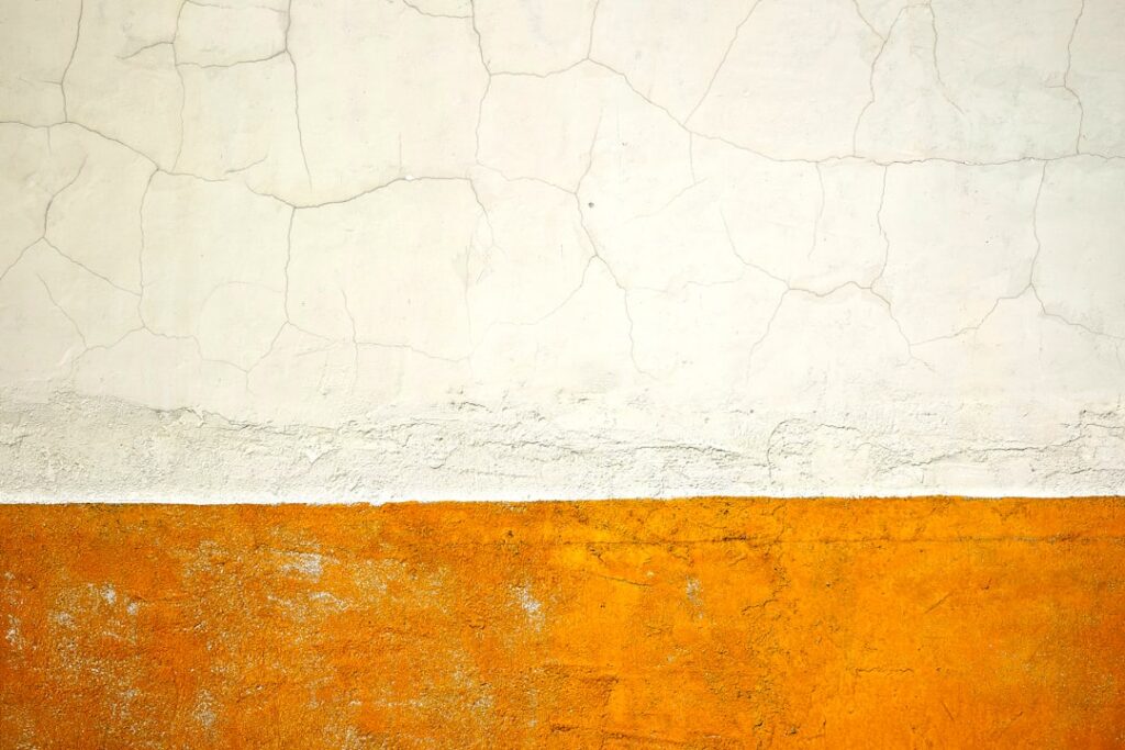 Blank wall painted white and orange